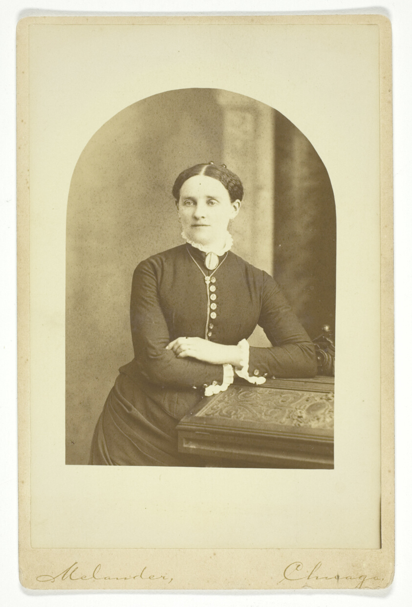 Woman seated at desk