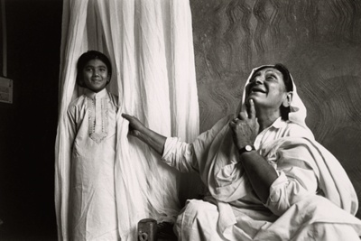Chaman tries to humor Ayesha before taking her away. I fear that she will make Ayesha into a singing girl, and I wanted to make her an educated and respectable woman, from the series "Myself Mona Ahmed"