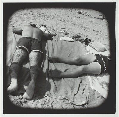 Untitled (Man and Woman Sunning on Blanket and Towel), from the series "Beach"