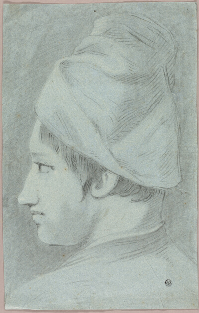 Head of Boy Wearing Hat in Profile