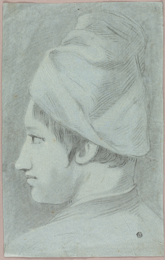 Head of Boy Wearing Hat in Profile