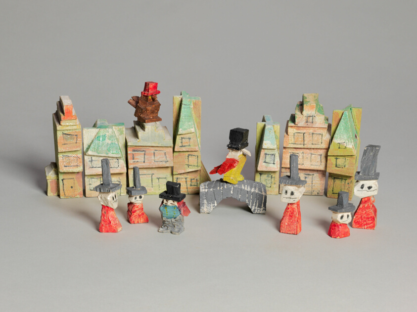 A Group of Houses and Figures