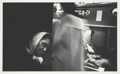 Woman Sleeping on Train