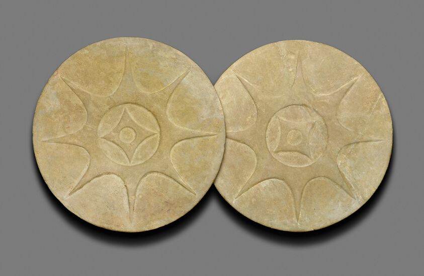 Pair of Earspools with Eight-Pointed Star Motif