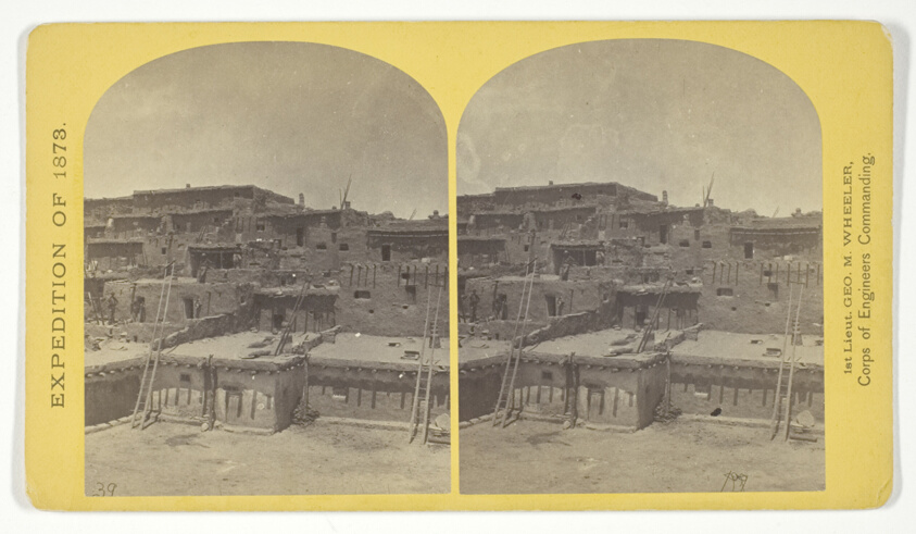 Indian Pueblo of Zuni, New Mexico; view from the interior. The "Pueblo" or town, encloses a quadrangular area within which are the ruins of a church built under the direction of the Jesuit missionaries. The houses are built one above the other to the height of five or six stories. The entrances are mostly from the top, the ascent and descent being made by ladders, No. 16 from the series "Geographical Explorations and Surveys West of the 100th Meridian"