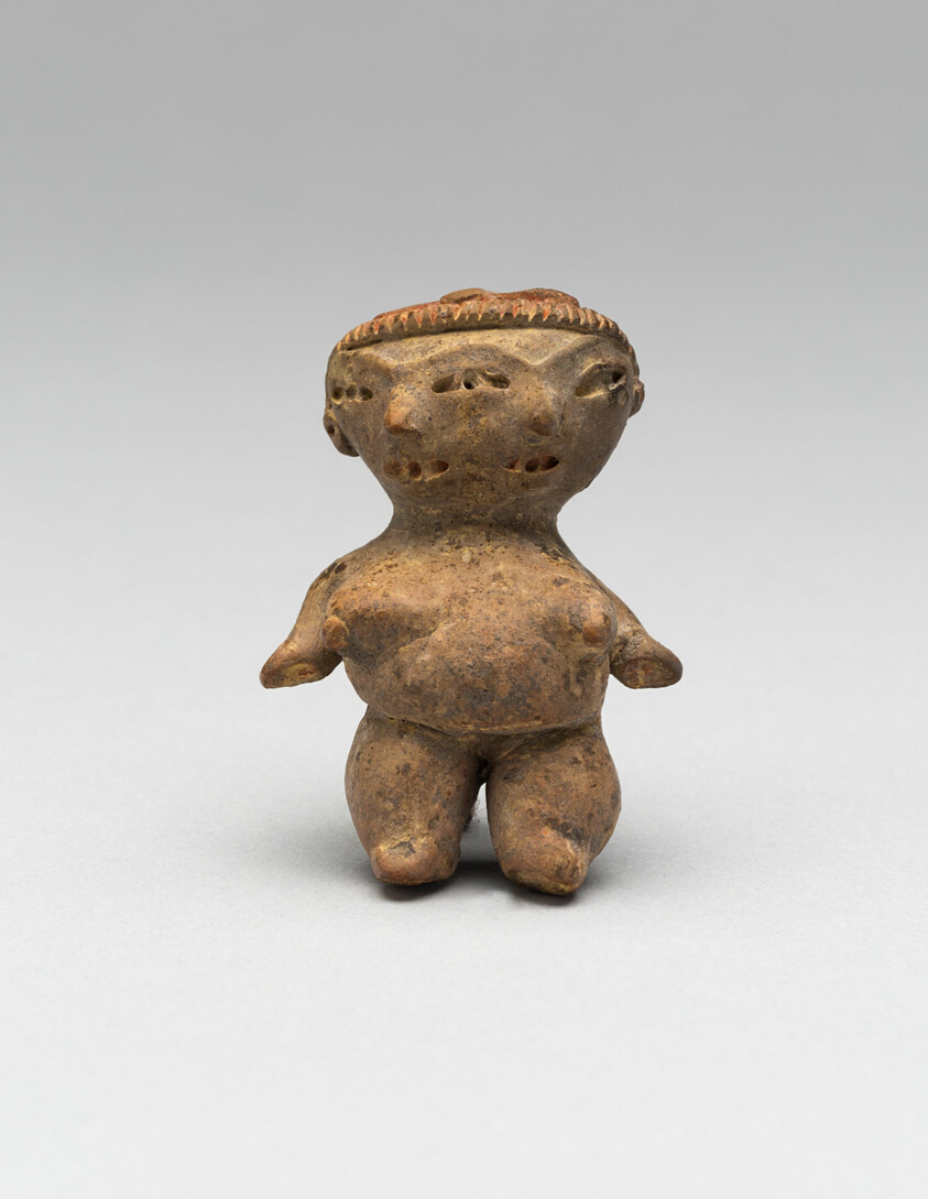 Double-Faced Female Figurine