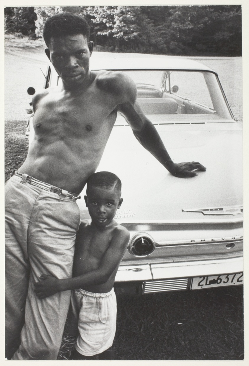 Man and Child Leaning on Car, Tennessee