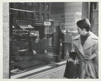 Jimmy Seated in a Store Window