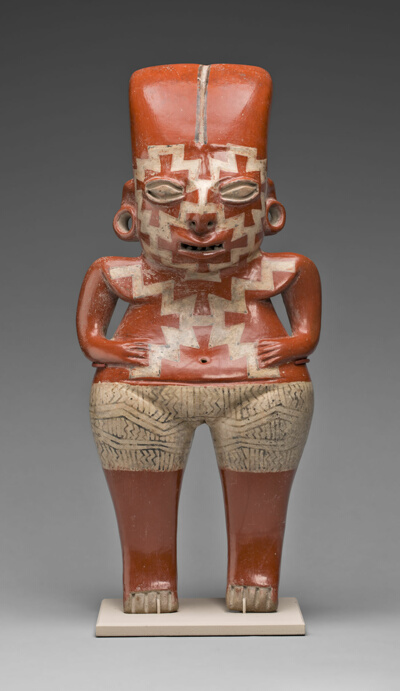 Female Figure with Geometric Face and Body Paint