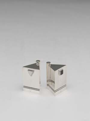 Salt and Pepper Shakers Entitled "Symetra"