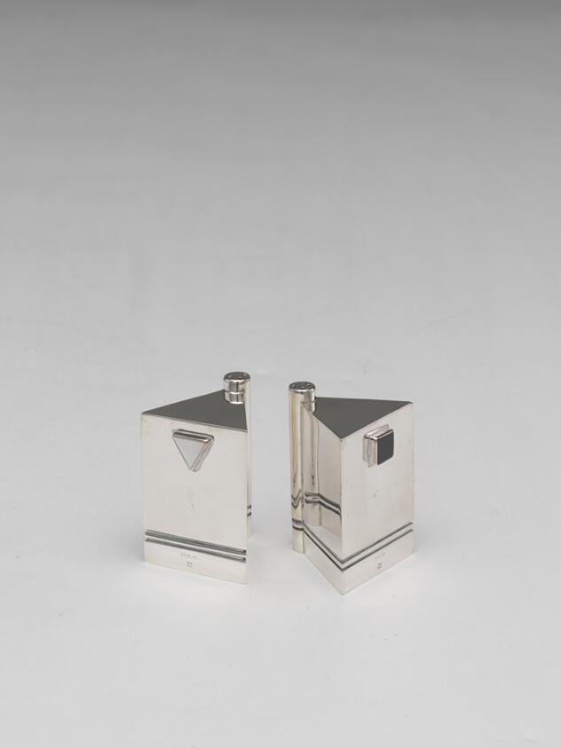 Salt and Pepper Shakers Entitled "Symetra"