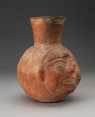 Jar in the Form of a Human Head Showing Teeth