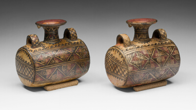 Drum-Shaped Vessels with Textile Motif