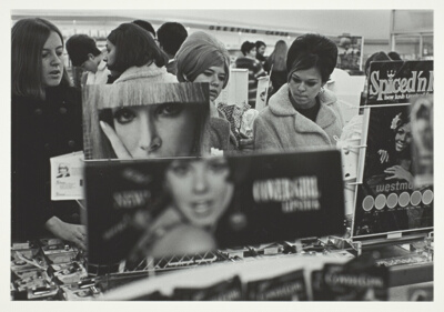 Untitled (Store Counter with Girls and Signs)