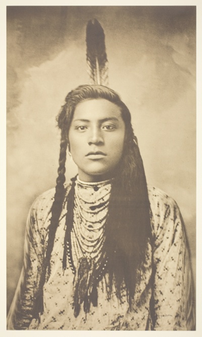 Portrait of Indian with one Feather