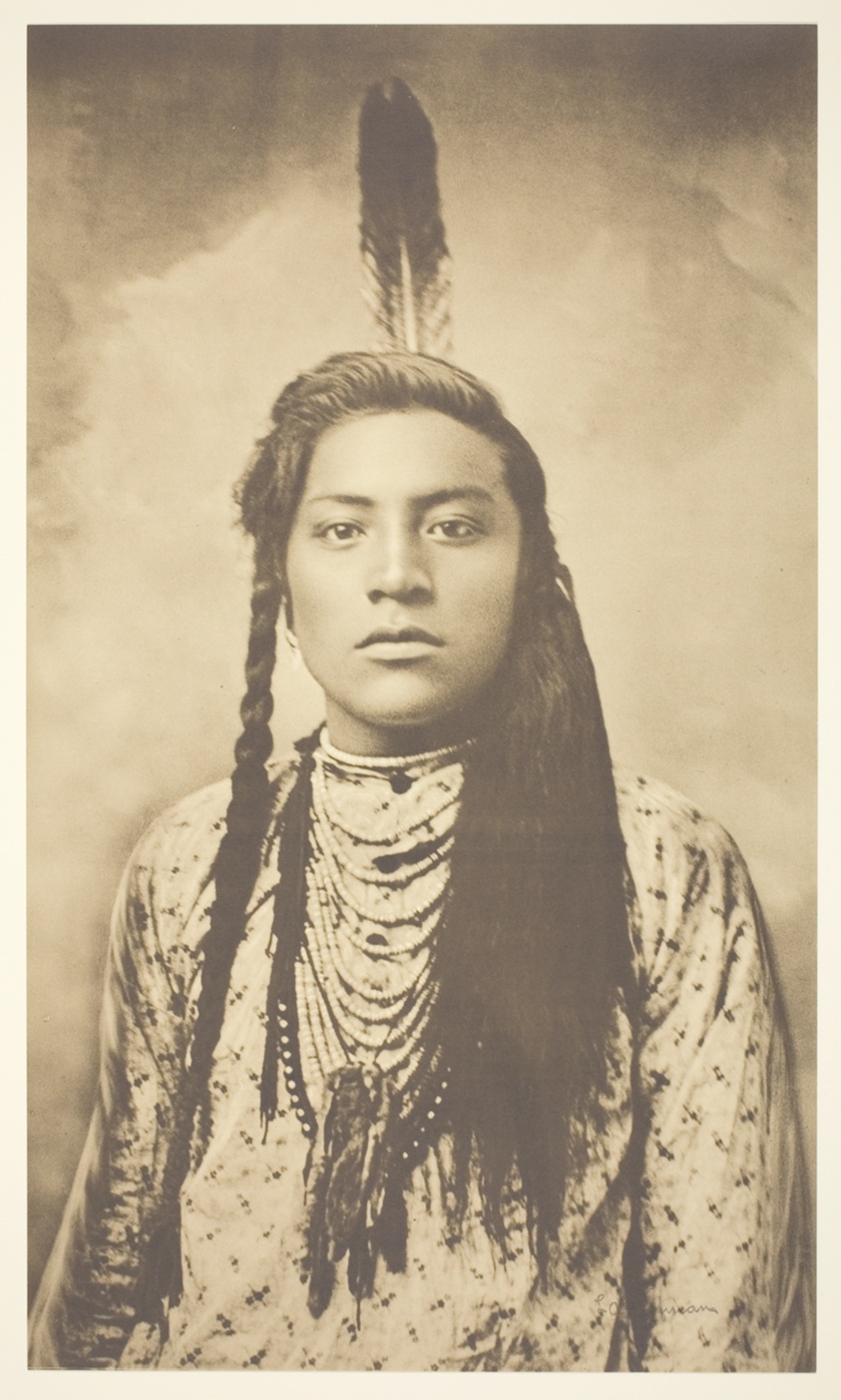 Portrait of Indian with one Feather