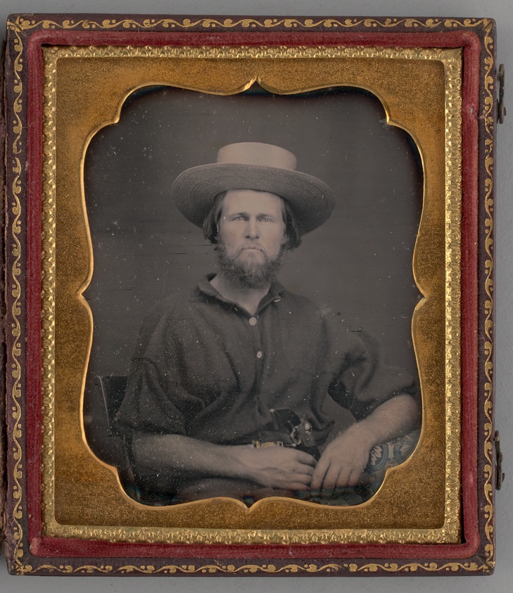Untitled (Portrait of a Man Wearing a Straw Hat)