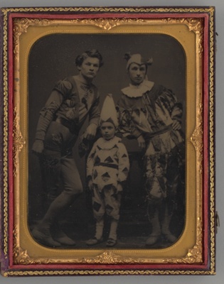 Untitled (Portrait of two Men and one Boy, Dressed in Clown Costumes)