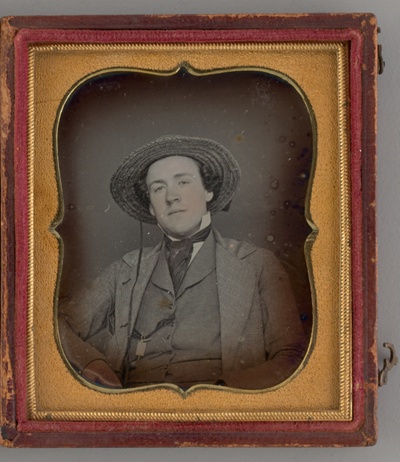Untitled (Portrait of a Man with a Straw Hat)