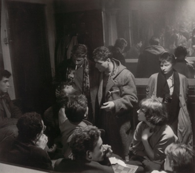 Girl Surrounded by Students in Saint-Germain-Des-Pres