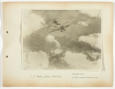 U.S. bombing airplane above clouds