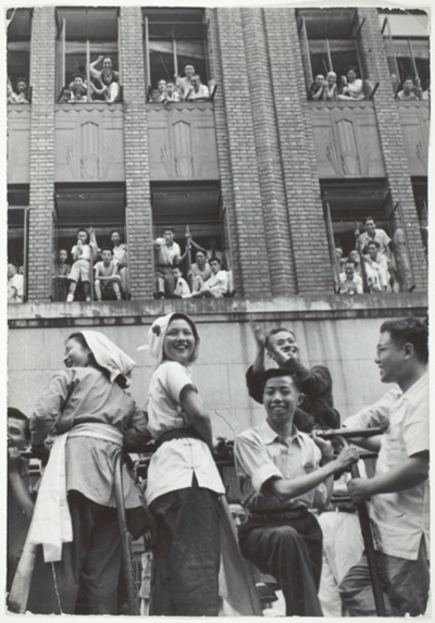 People Gathered in Windows Looking Down on Parade, July 6 Parade, Shanghai