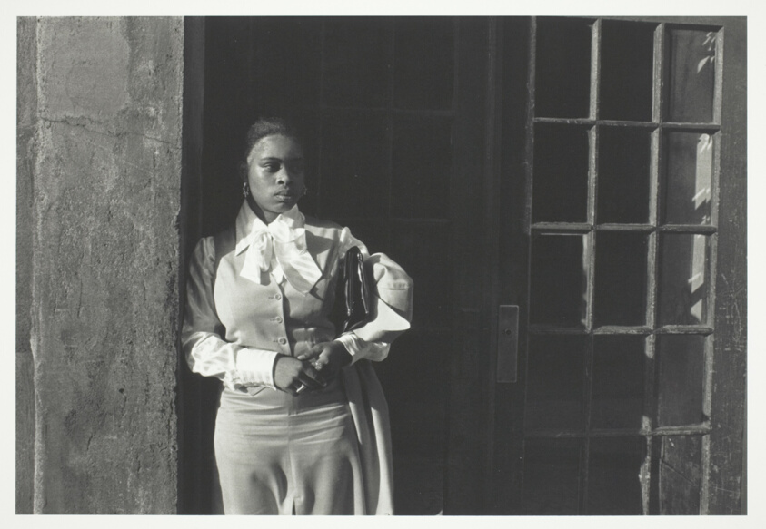A Woman Waiting in the Doorway