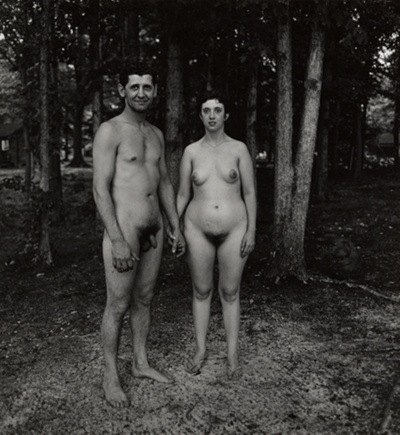A husband and wife in the woods at a nudist camp, N.J.
