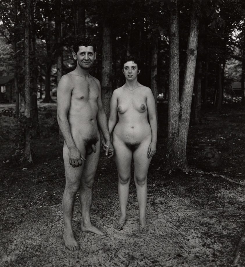 A husband and wife in the woods at a nudist camp, N.J.
