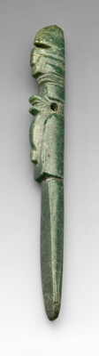 Carved Pendant Depicting a Costumed Figure with a Abstract Bird Headdress