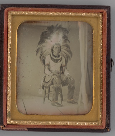 Untitled (Portrait of Seated Man with Headdress)