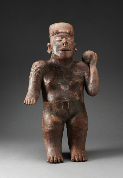 Standing Male Figure Holding a Ball