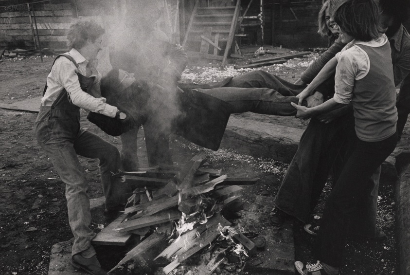 Boys Holding Girl over Bonfire, Manchester, England