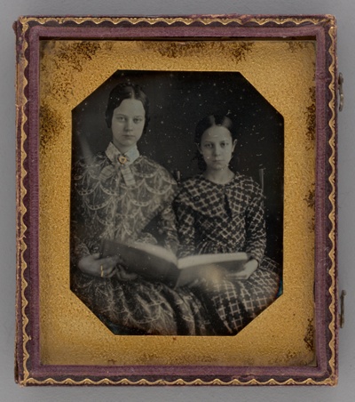 Untitled (Portrait of Seated Two Girls Holding a Book)
