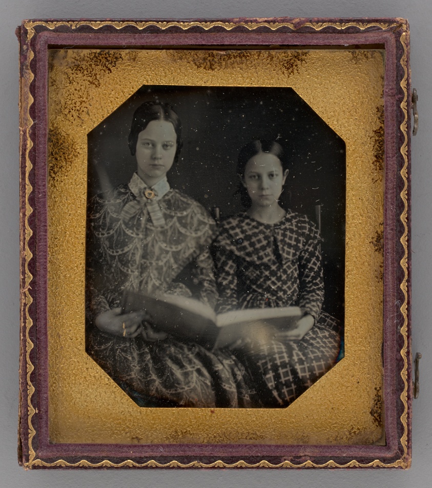 Untitled (Portrait of Seated Two Girls Holding a Book)