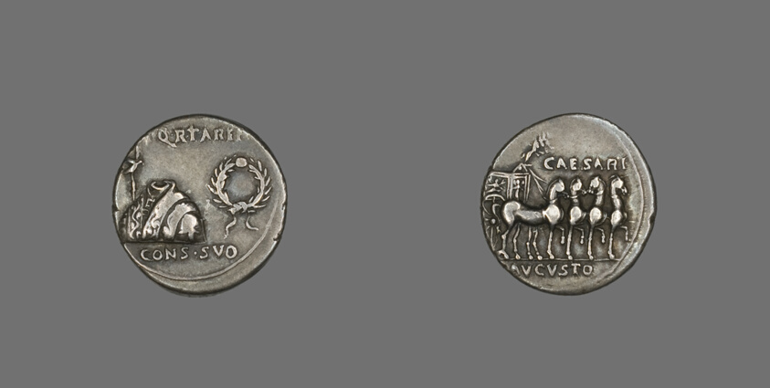 Coin Depicting a Toga, Tunic and Wreath