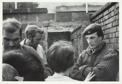 A Lt. Listening to a Complaint About the Conduct of his Men