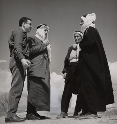 Four Men Talking in Desert, Syria