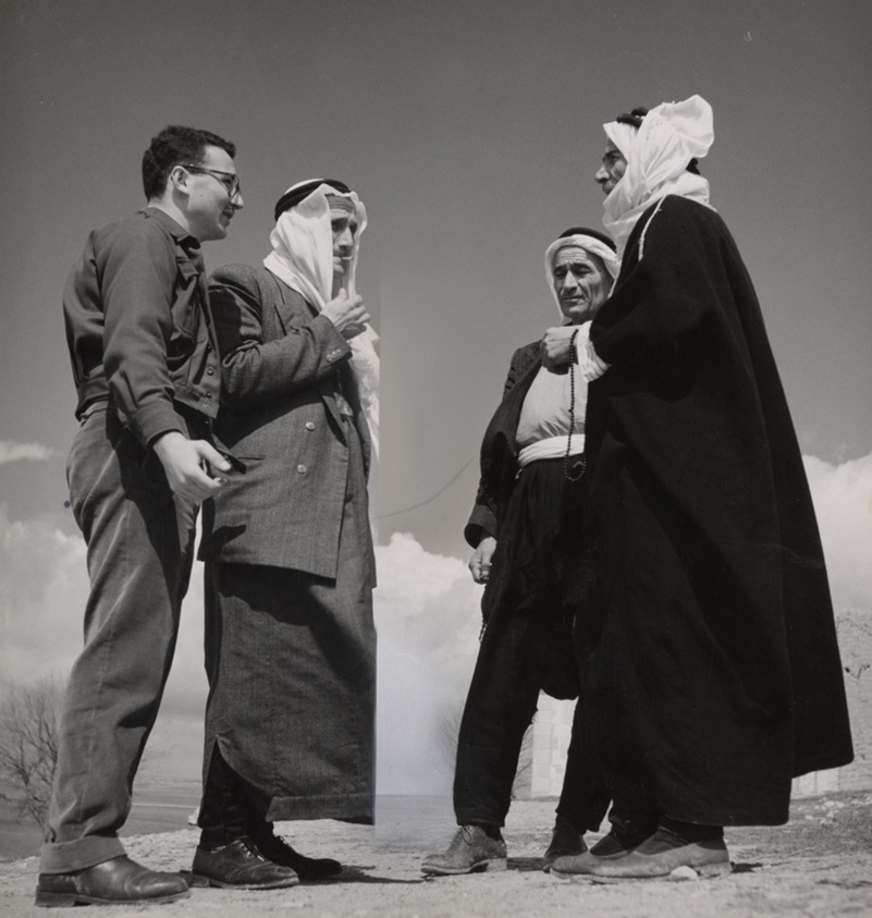 Four Men Talking in Desert, Syria