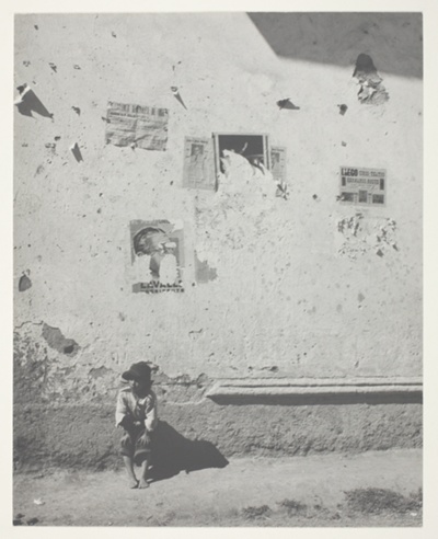 Peruvian Child Seated by a Wall
