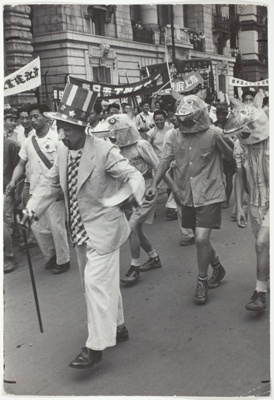 Masks and Banners in Anti-US Shanghai Parade