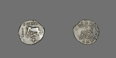 Coin Depicting Cow Suckling Calf