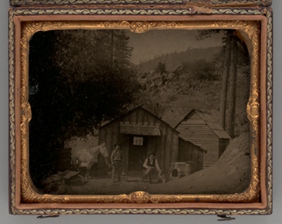 Untitled (Two Miners in Front of a Shack)