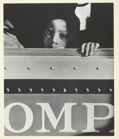 Young Black Child in Bus (Negerbub im Autobus)