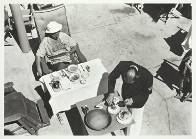 Brunch being served to winter visitor in private club, Miami, Florida