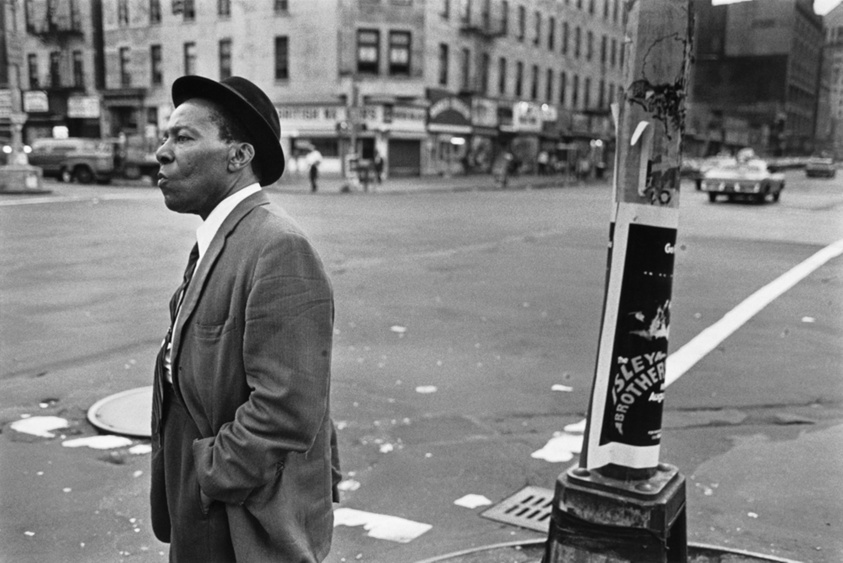 A Man on the Corner of Lenox Avenue & 125th Street, from the series "Harlem, U.S.A."